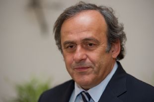 Platini wants referees to take responsibility for response to racist abuse